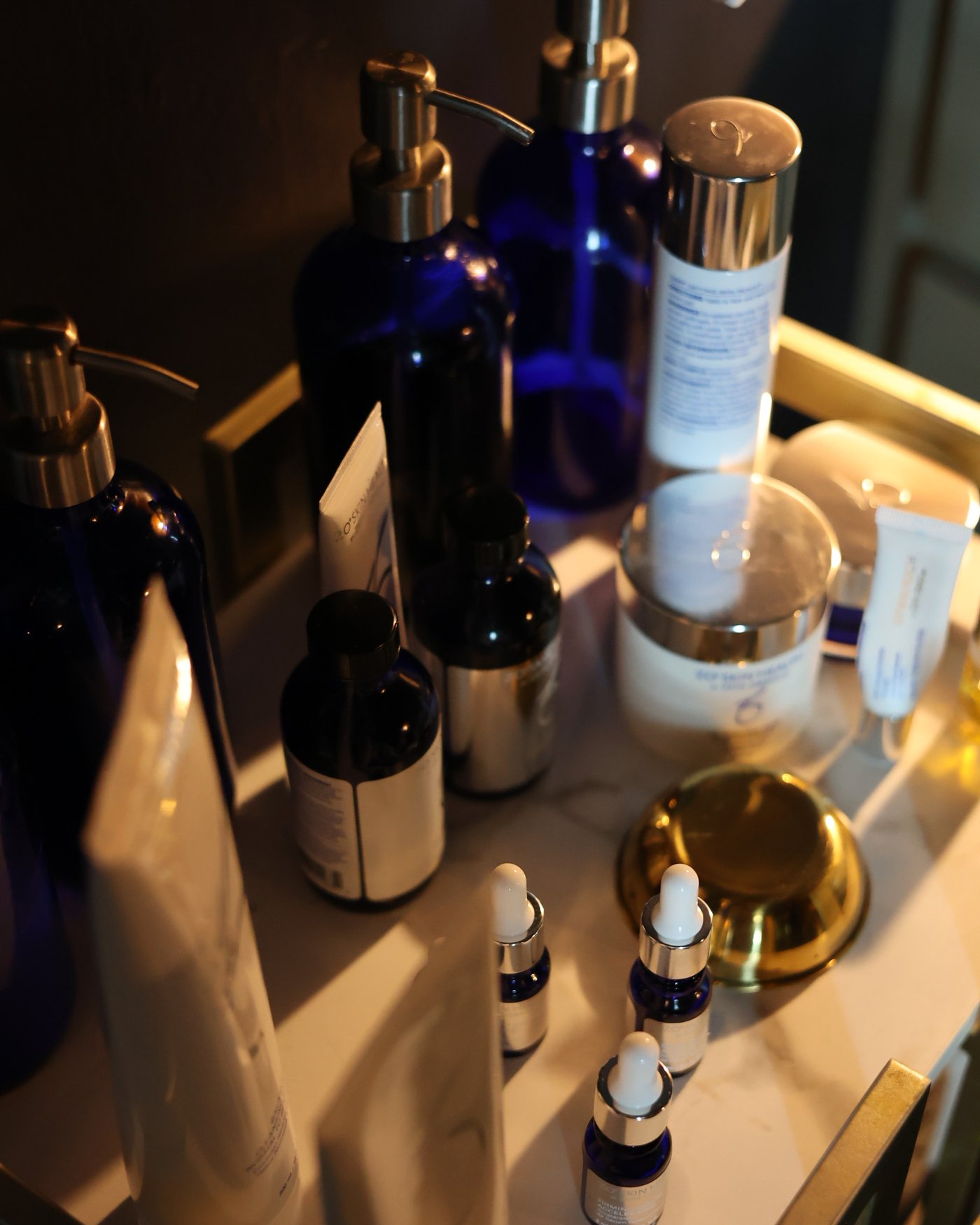 ZO Skin Health products on the brass cart at Gudgel Aesthetics