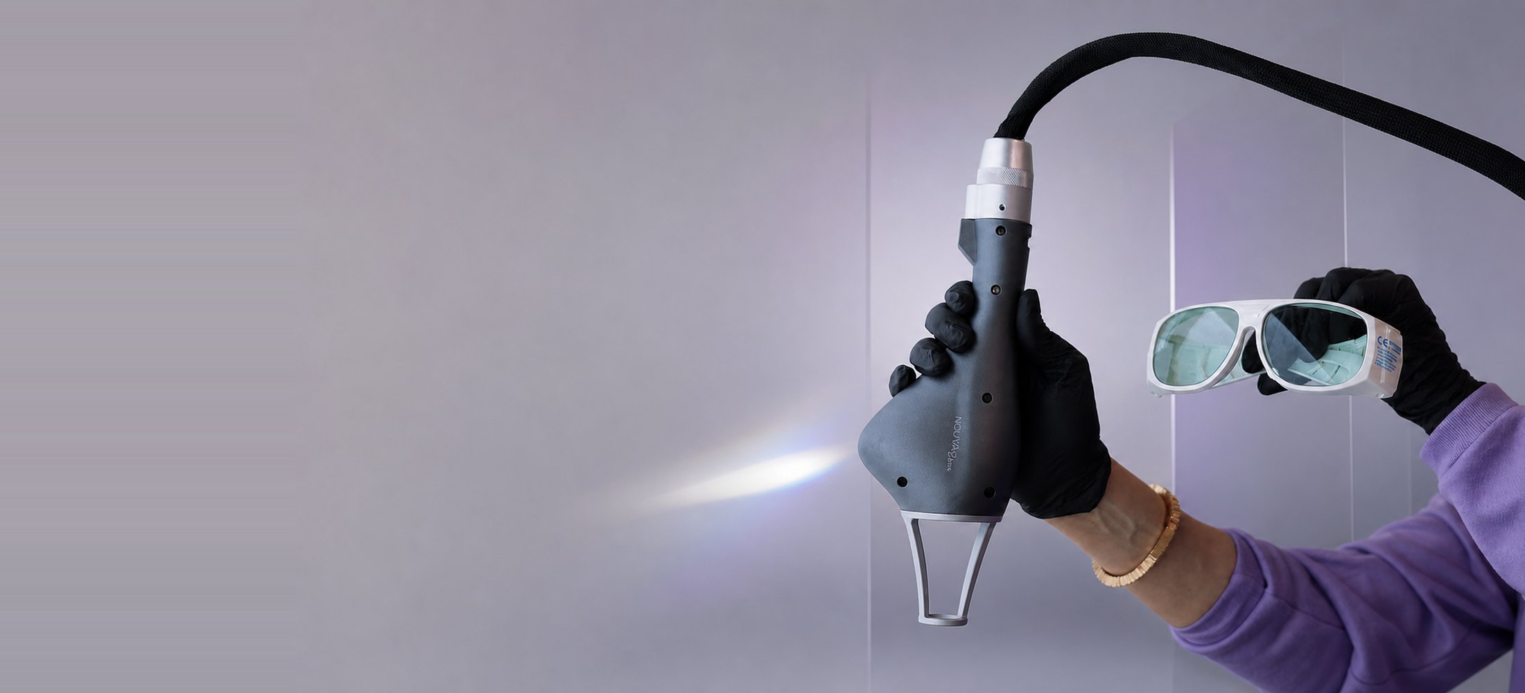 Laser handpiece and protective eyewear at Gudgel Aesthetics